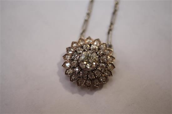 A Victorian gold, silver and diamond cluster sunburst pendant, pendant 1in.